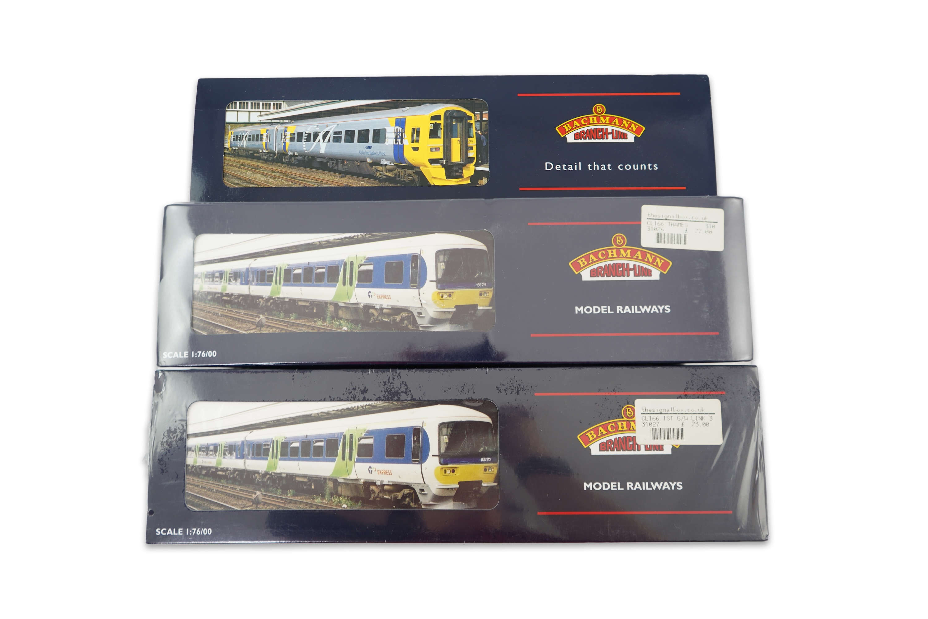 Three Bachmann Branchline 00 gauge railway DMU sets; 166 Turbo 3-car DMU, Thames Trains (31-026), 166 Turbo 3-car DMU, First Great Western/Link (31-027) and 158 2-car DMU, Wales and West (31-506)